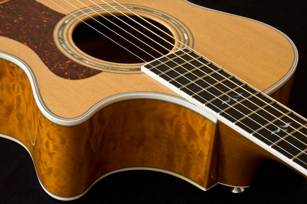 Taylor 612c side and cutaway acoustic guitar