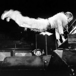 Elton John concert. playing piano jump