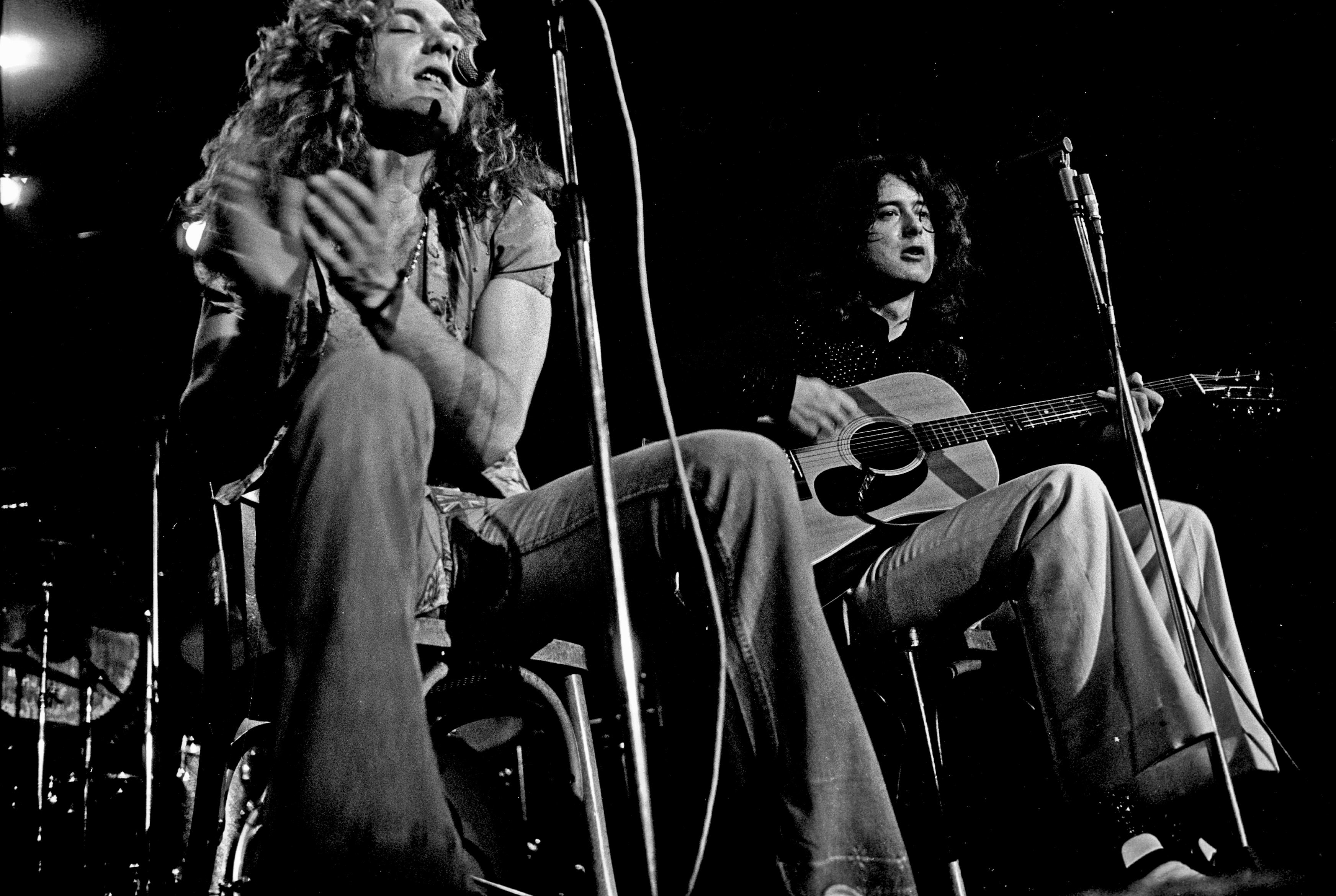 Led Zeppelin acoustic on stage. Page and Plant.