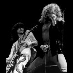 Led Zeppelin in concert. Robert Plant singing on stage with Jimmy Page