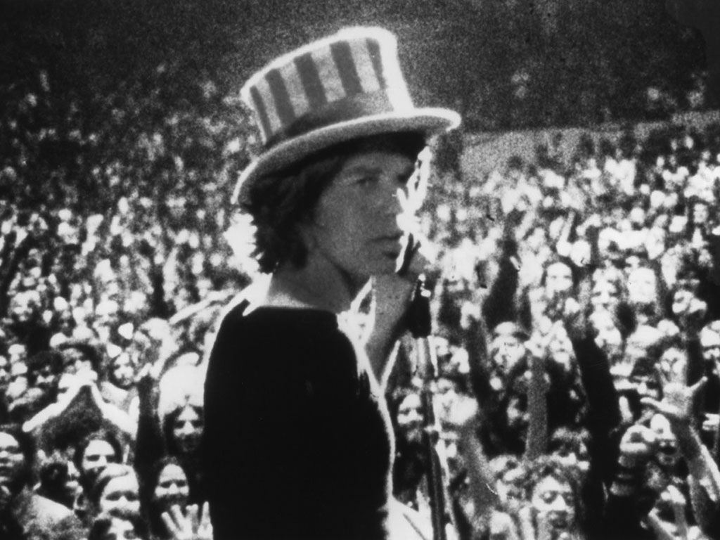 Mick Jagger on Stage. Young with Crowd