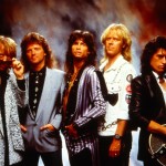 Very tan Aerosmith band members from the 80's