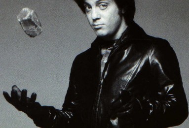 Young Billy Joel, leather jacket. Sound better singing in studio.