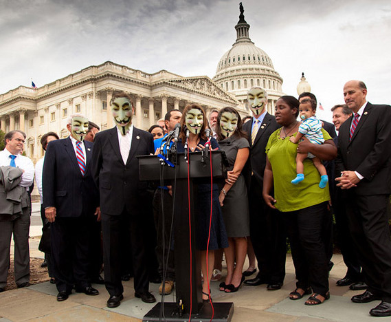 Tea Party Caucus with masks on