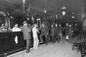 Foot on the rail in saloon, early 1900s