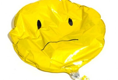 Deflated balloon, sad face
