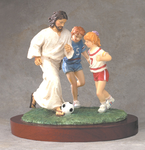 Jesus playing soccer