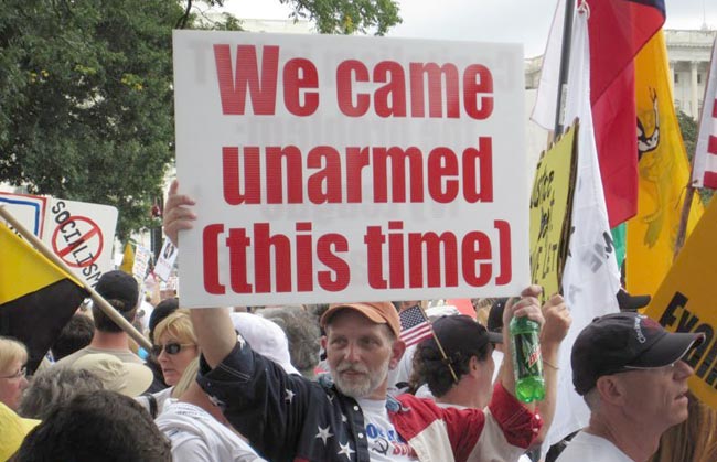 protest sign, we came unarmed this time, rally