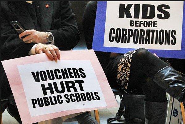 School voucher protest signs