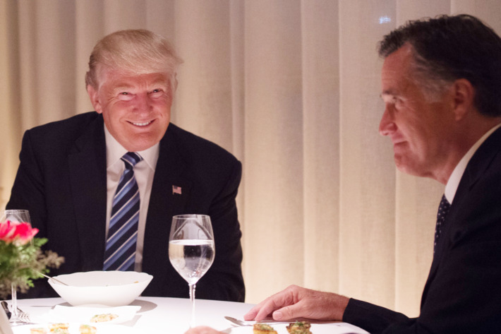 Donald Trump, Mitt Romney, seated at table