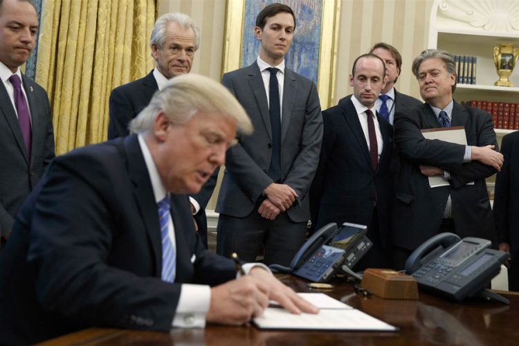 Donald Trump signing executive order, Steve Bannon, Jared Kushner